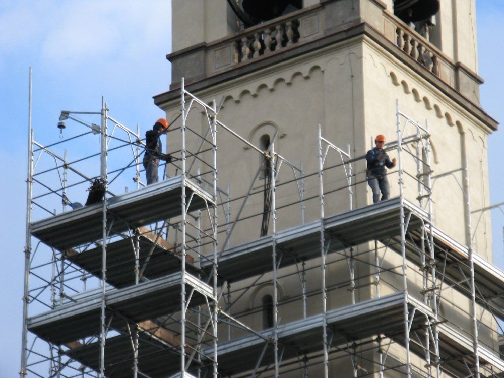 Operai a lavoro Studio ingegneristico Tentori